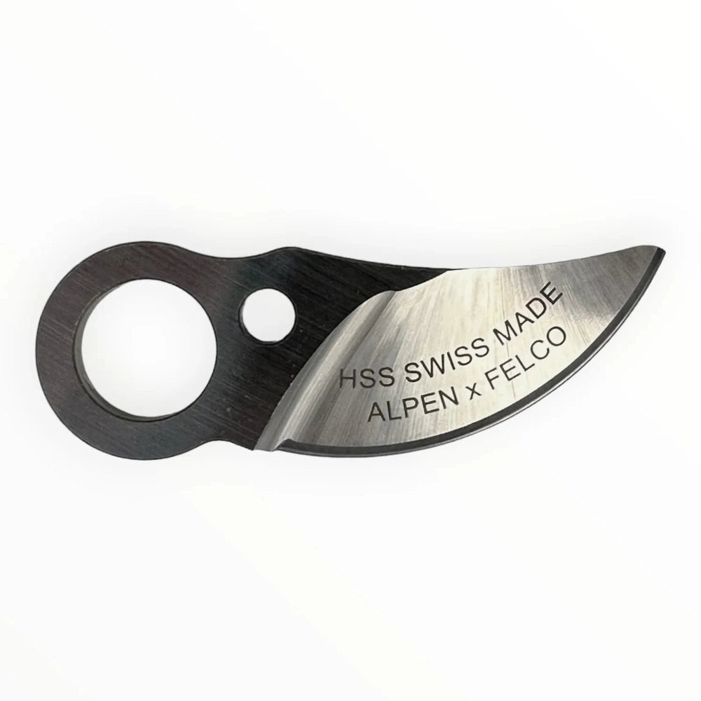 Alpen HSS Swiss Made replacement blade with curved edge and circular hole for easy grip and precision cutting.