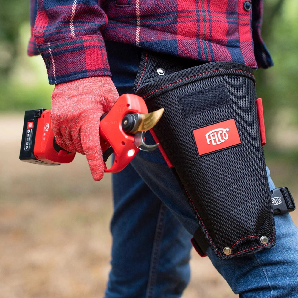 Felco 834W wood cutting tool with holster, designed for precise cutting, ideal for arborists and landscaping professionals.
